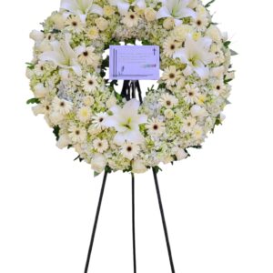 corona picarón de liliums y gerberas